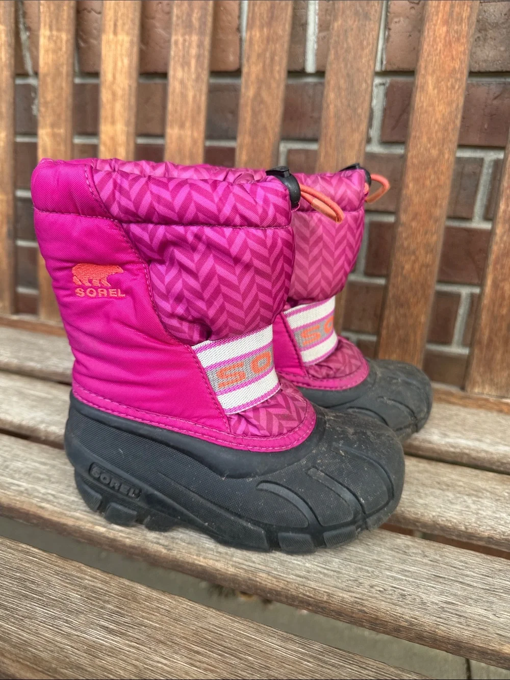 Sorel Kids' Magenta Pink Snow Boots with Black Soles